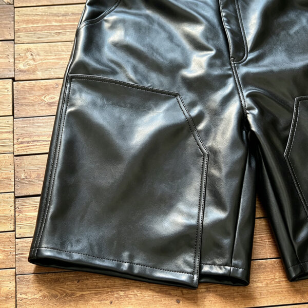 IMG_20260727_175510 Model wearing embroidered double layer leather shorts